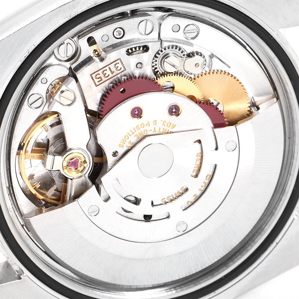 This image shows the internal movement mechanism of a Rolex Datejust 116234 Men's Stainless Steel Blue Dial 116234 Men's Stainless Steel Blue Dial watch from a close-up angle.