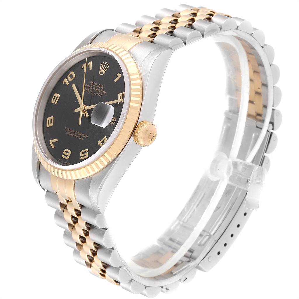 This image shows a side view of the Rolex Datejust 16233 Men's Steel and Gold (two tone) Grey Dial 16233 Men's Steel and Gold (two tone) Grey Dial watch, highlighting its black dial, two-tone bracelet, and fluted bezel.