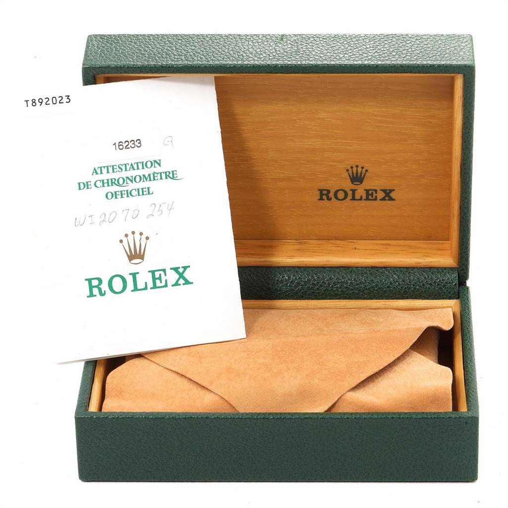 This image shows a Rolex watch box and documentation for the Datejust model.