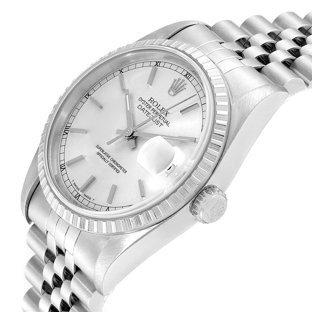 The image shows a close-up of a Rolex Datejust 16220 Men's Stainless Steel Silver Dial 16220 Men's Stainless Steel Silver Dial watch at a slight angle, highlighting its dial, bezel, and crown.