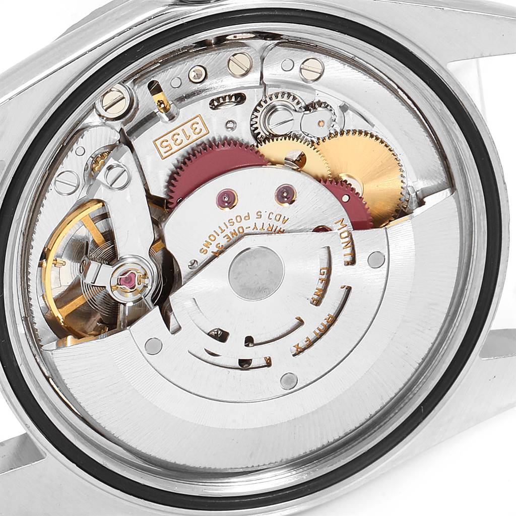 This image shows a close-up view of the movement mechanism of a Rolex Datejust 16220 Men's Stainless Steel Silver Dial 16220 Men's Stainless Steel Silver Dial watch.