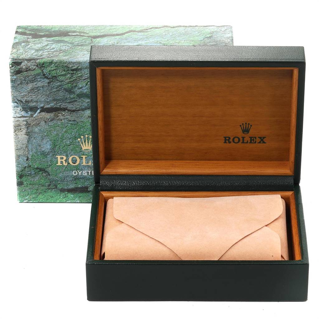 The image shows a Rolex Datejust 16220 Men's Stainless Steel Silver Dial 16220 Men's Stainless Steel Silver Dial model watch box, featuring a wooden interior and a green Rolex-branded outer packaging.