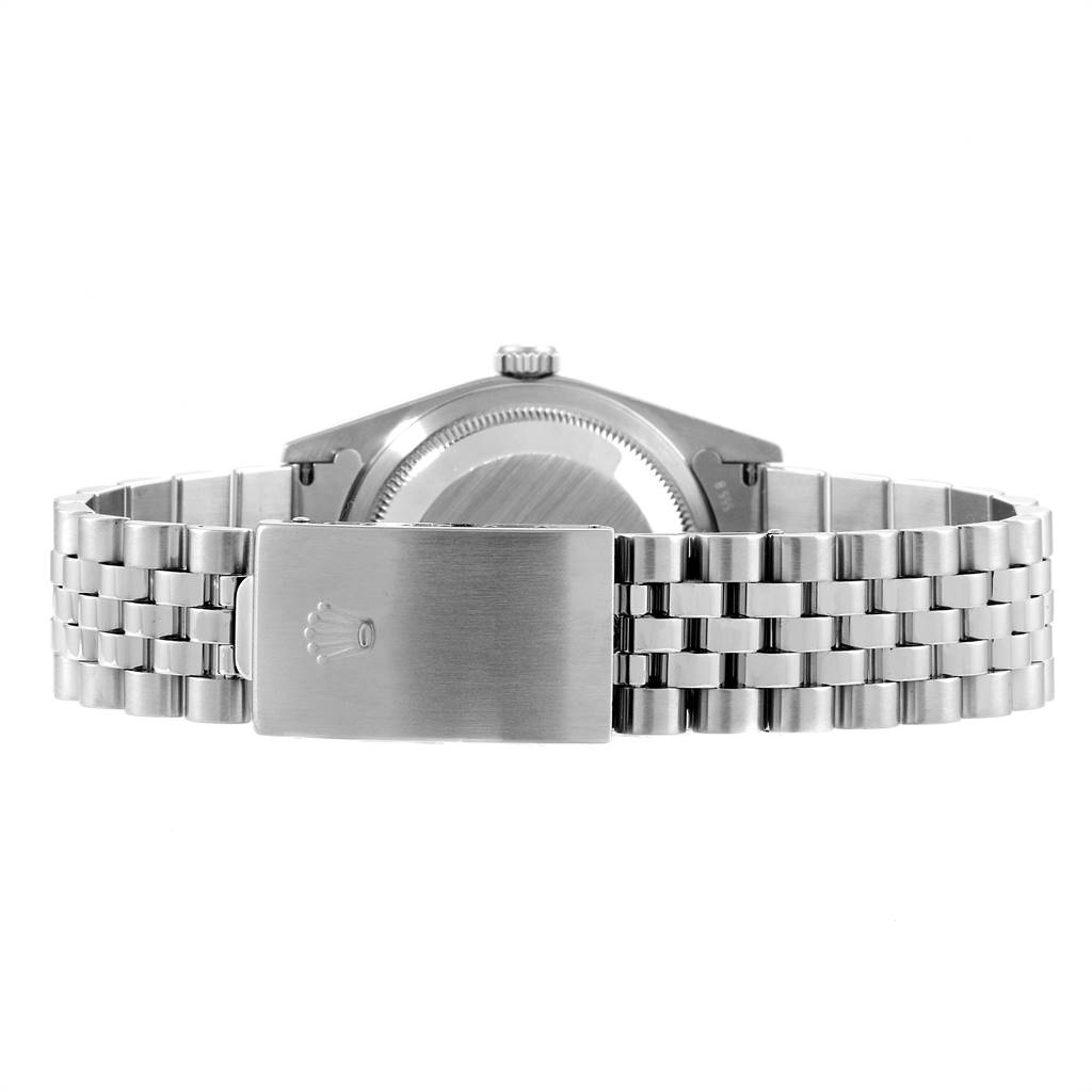 This image shows the back view of a Rolex Datejust 16220 Men's Stainless Steel Silver Dial 16220 Men's Stainless Steel Silver Dial watch, highlighting its clasp, bracelet, and case back.