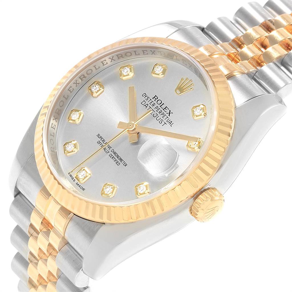 The Rolex Datejust 116233 Men's Steel and Gold (two tone) Silver Dial 116233 Men's Steel and Gold (two tone) Silver Dial watch is shown from a slight side angle, highlighting its face, crown, and part of the bracelet.