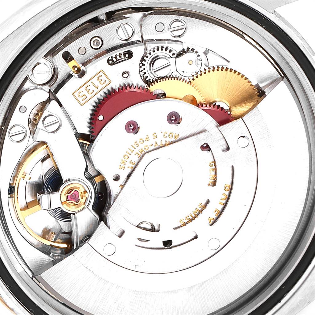 This image shows the internal mechanical movement of a Rolex Datejust 116243 Men's Steel and Gold (two tone) White Dial 116243 Men's Steel and Gold (two tone) White Dial watch from a close-up angle.