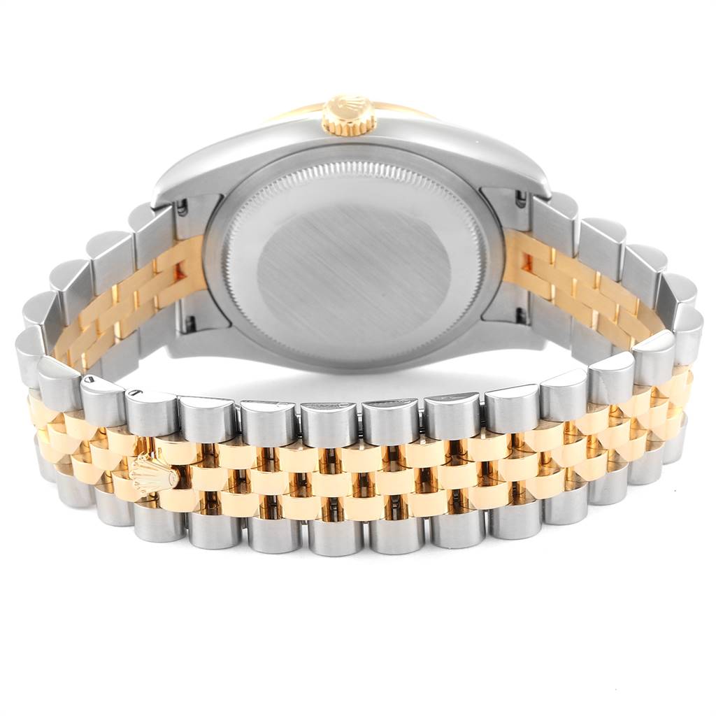 This image shows the case back and bracelet of a Rolex Datejust 116243 Men's Steel and Gold (two tone) White Dial 116243 Men's Steel and Gold (two tone) White Dial watch, featuring a two-tone metal design.