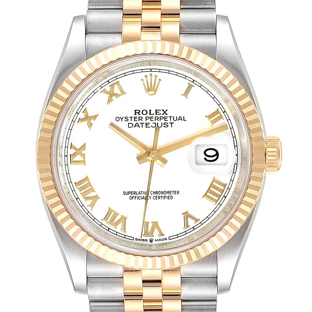 The image shows a close-up of a Rolex Datejust 126233 Men
s Steel and Gold (two tone) White Dial 126233 Men
s Steel and Gold (two tone) White Dial watch, highlighting its face, bezel, and part of the bracelet.