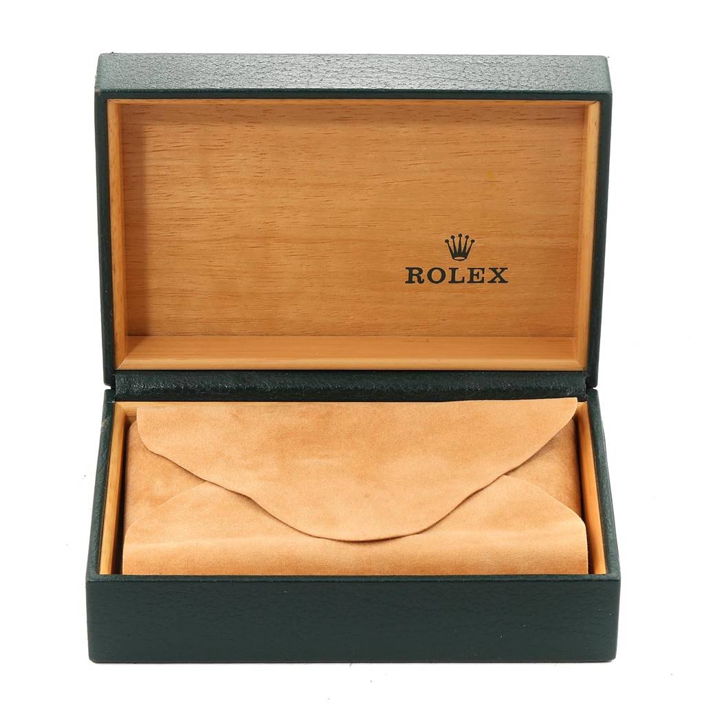 The image shows an open wooden Rolex Datejust 16233 Men's Steel and Gold (two tone) Blue Dial 16233 Men's Steel and Gold (two tone) Blue Dial watch box with a suede pouch inside.