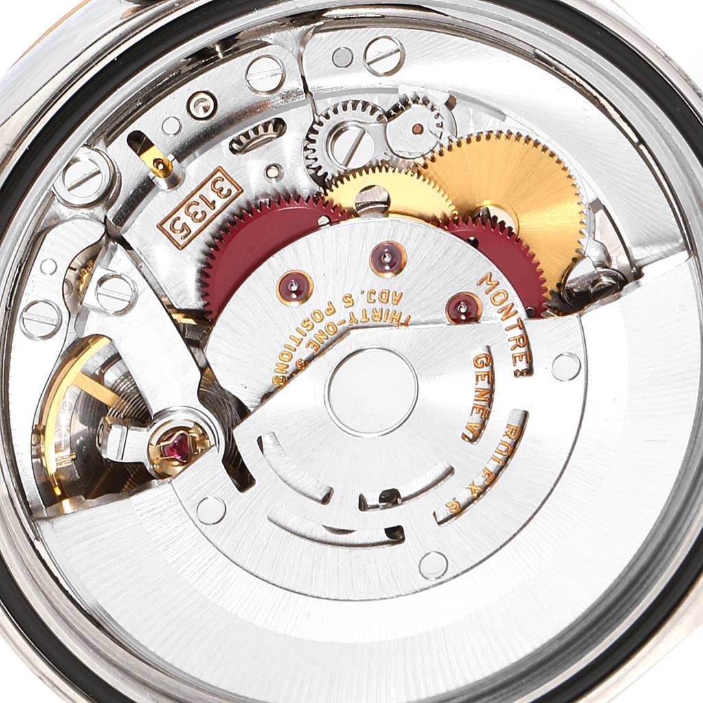This image shows the internal mechanical movement of a Rolex Datejust 16233 Men's Steel and Gold (two tone) Grey Dial 16233 Men's Steel and Gold (two tone) Grey Dial watch, highlighting gears and intricate components.