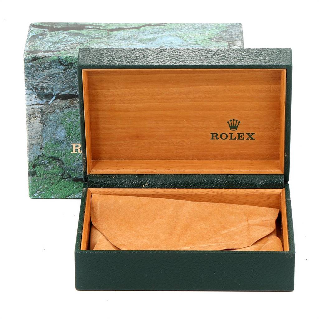 The image shows an opened wooden Rolex watch box, likely for a Datejust model, with the Rolex logo inside.