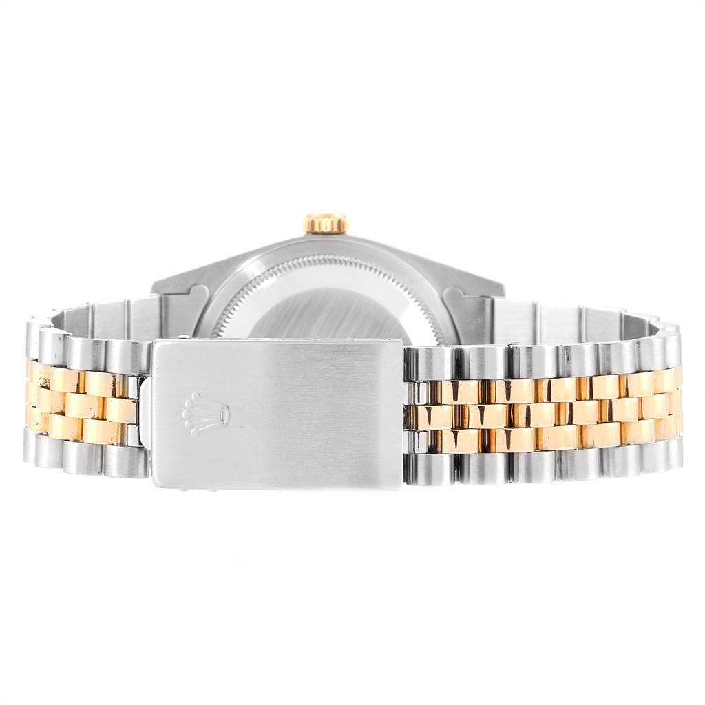 This image shows the back view of a Rolex Datejust 16233 Men
s Steel and Gold (two tone) Champagne Dial 16233 Men
s Steel and Gold (two tone) Champagne Dial, highlighting the bi-metal bracelet and closed clasp.