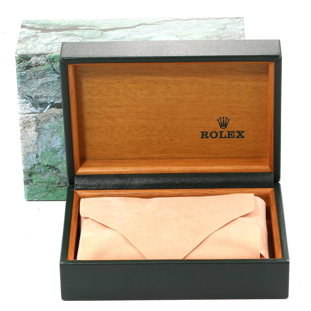 The image shows an empty Rolex Datejust 16234 Men's Stainless Steel White Dial 16234 Men's Stainless Steel White Dial watch box with a green exterior and wooden interior.