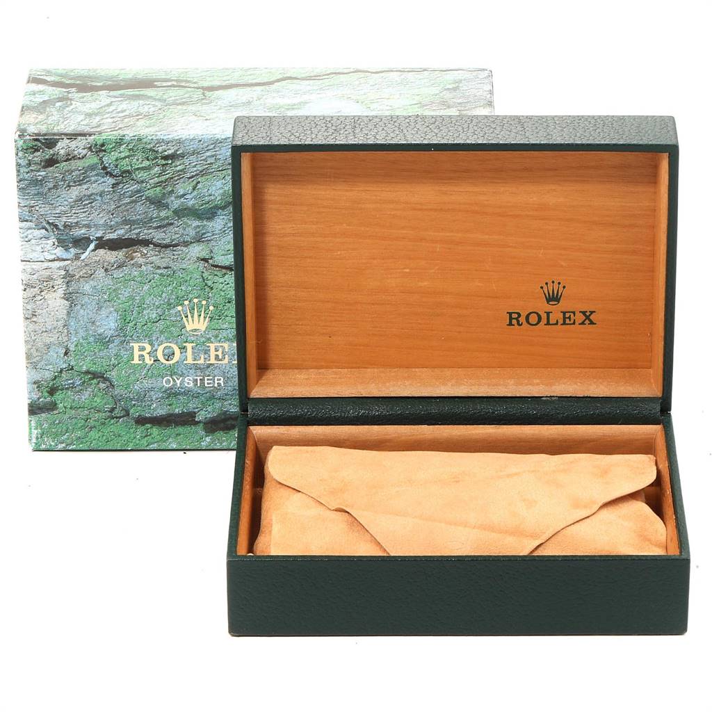 This image shows an open Rolex Datejust 16233 Men
s Steel and Gold (two tone) Champagne Dial 16233 Men
s Steel and Gold (two tone) Champagne Dial watch box with a Rolex-branded exterior box in the background.