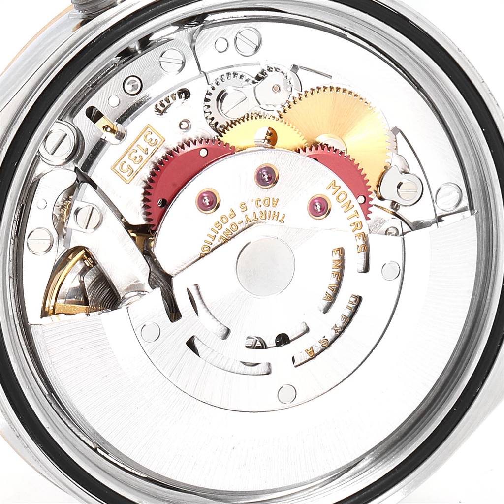 The image shows the internal movement mechanism of the Rolex Datejust 16233 Men
s Steel and Gold (two tone) Champagne Dial 16233 Men
s Steel and Gold (two tone) Champagne Dial model from a rear angle.