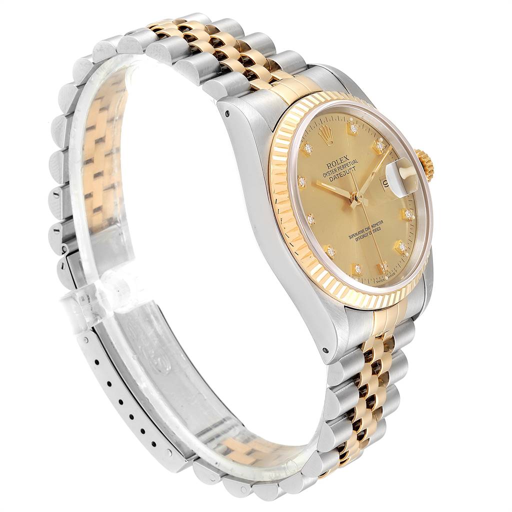 The image shows a side angle of a Rolex Datejust 16233 Men
s Steel and Gold (two tone) Champagne Dial 16233 Men
s Steel and Gold (two tone) Champagne Dial watch, highlighting the gold and silver jubilee bracelet, case, and champagne dial.
