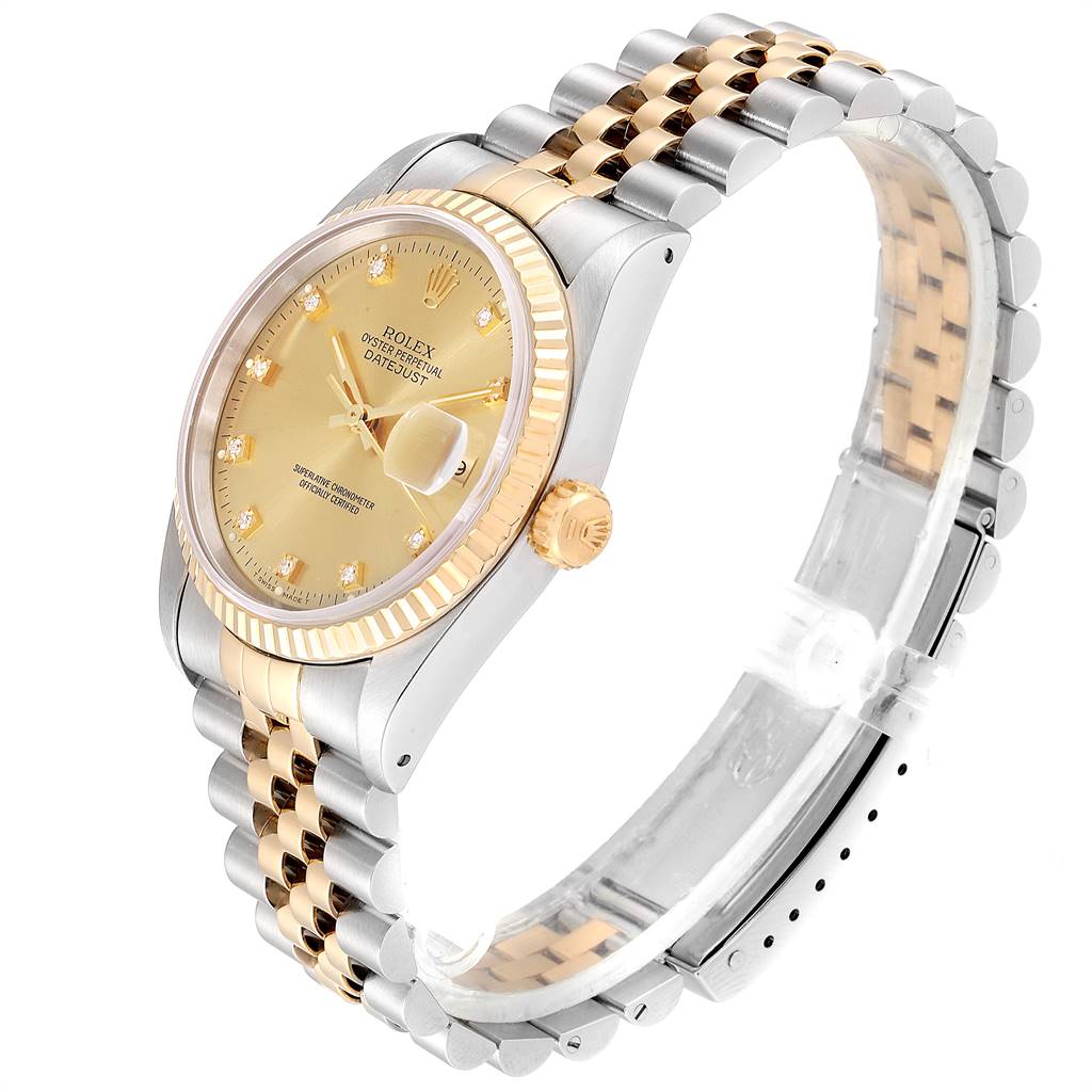This image shows a Rolex Datejust 16233 Men
s Steel and Gold (two tone) Champagne Dial 16233 Men
s Steel and Gold (two tone) Champagne Dial watch at a three-quarter angle, highlighting the dial, bezel, crown, and two-tone Jubilee bracelet.