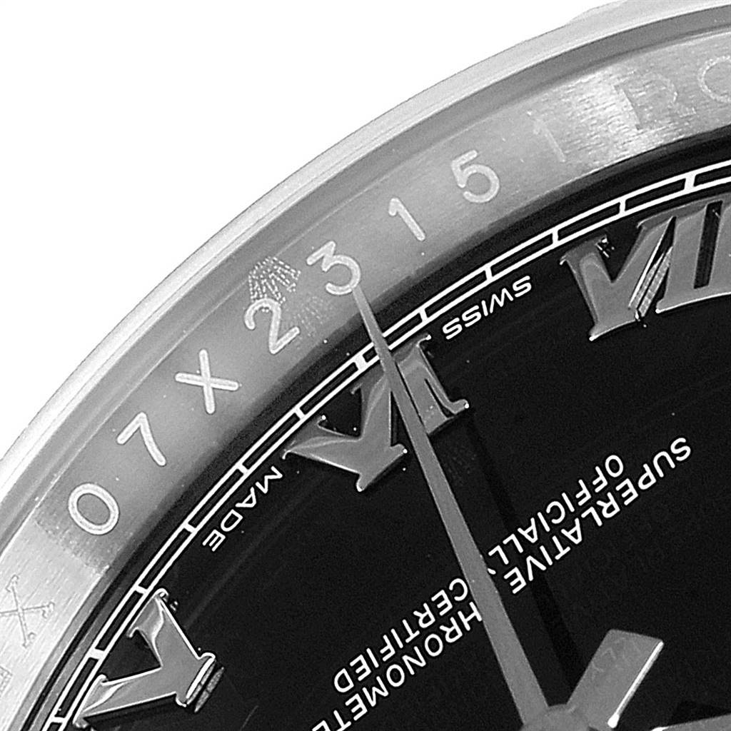 This image shows a close-up of the dial and part of the bezel of the Rolex Datejust 116234 Men's Stainless Steel Black Dial 116234 Men's Stainless Steel Black Dial watch, focusing on the numerals and hour marks.