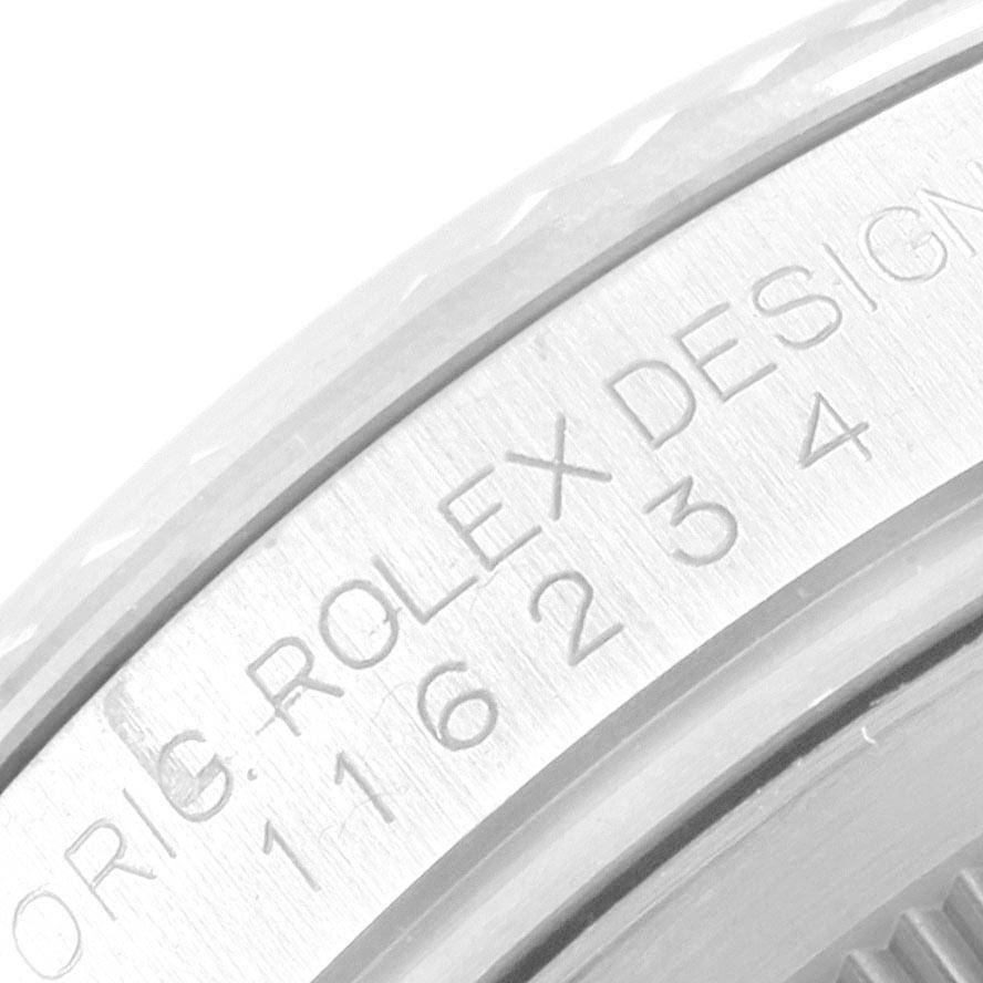 The image shows a close-up view of the bezel and case engraving of a Rolex Datejust 116234 Men's Stainless Steel Black Dial 116234 Men's Stainless Steel Black Dial watch.