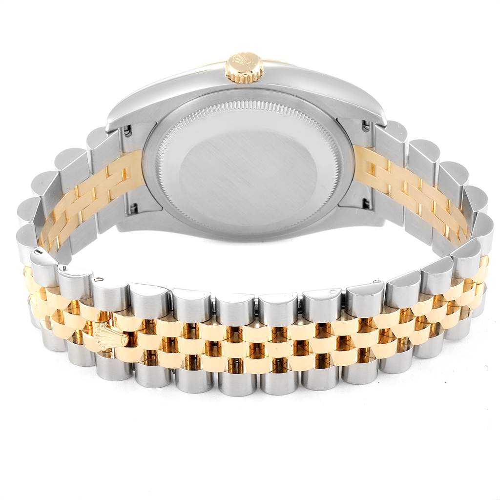 The image shows the back view of a Rolex Datejust 116233 Men
s Stainless Steel Silver Dial 116233 Men
s Stainless Steel Silver Dial watch, highlighting its two-tone bracelet and caseback.