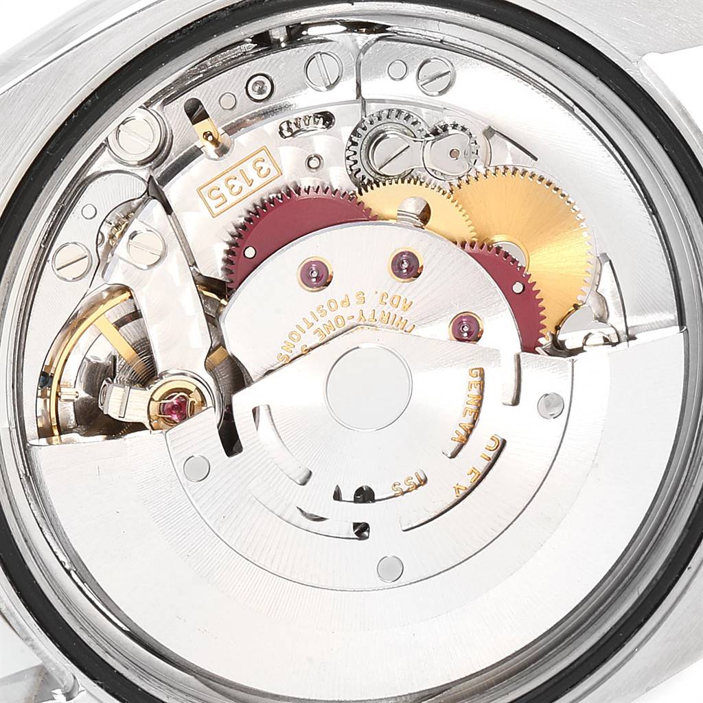 This image shows the internal mechanism of the Rolex Datejust 116233 Men
s Steel and Gold (two tone) Blue Dial 116233 Men
s Steel and Gold (two tone) Blue Dial watch from the back angle.