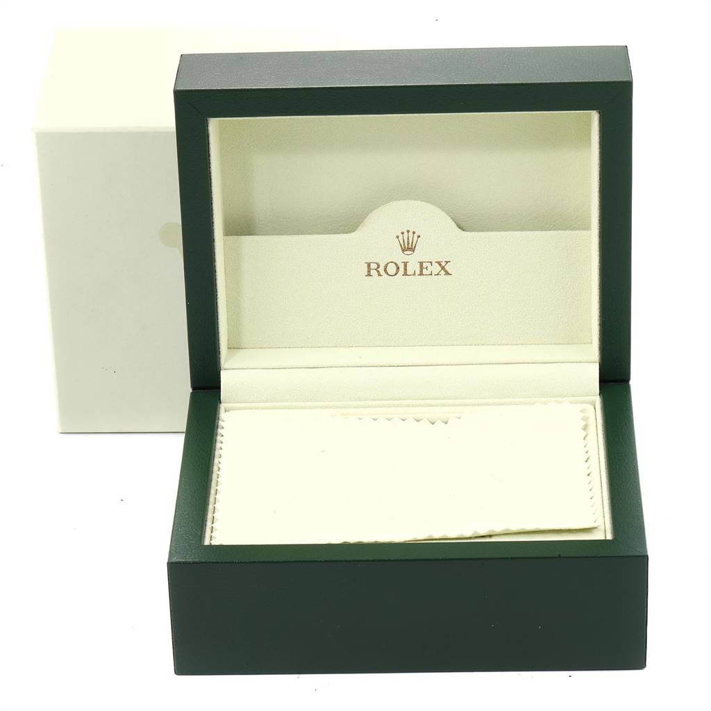 The image shows an open green Rolex Datejust 116233 Men
s Steel and Gold (two tone) Blue Dial 116233 Men
s Steel and Gold (two tone) Blue Dial watch box with an insert and the Rolex logo inside the lid.