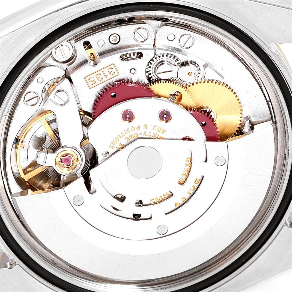 This image shows the internal movement mechanism of a Rolex Datejust 116233 Men's Stainless Steel White Dial 116233 Men's Stainless Steel White Dial watch from a top-down angle.