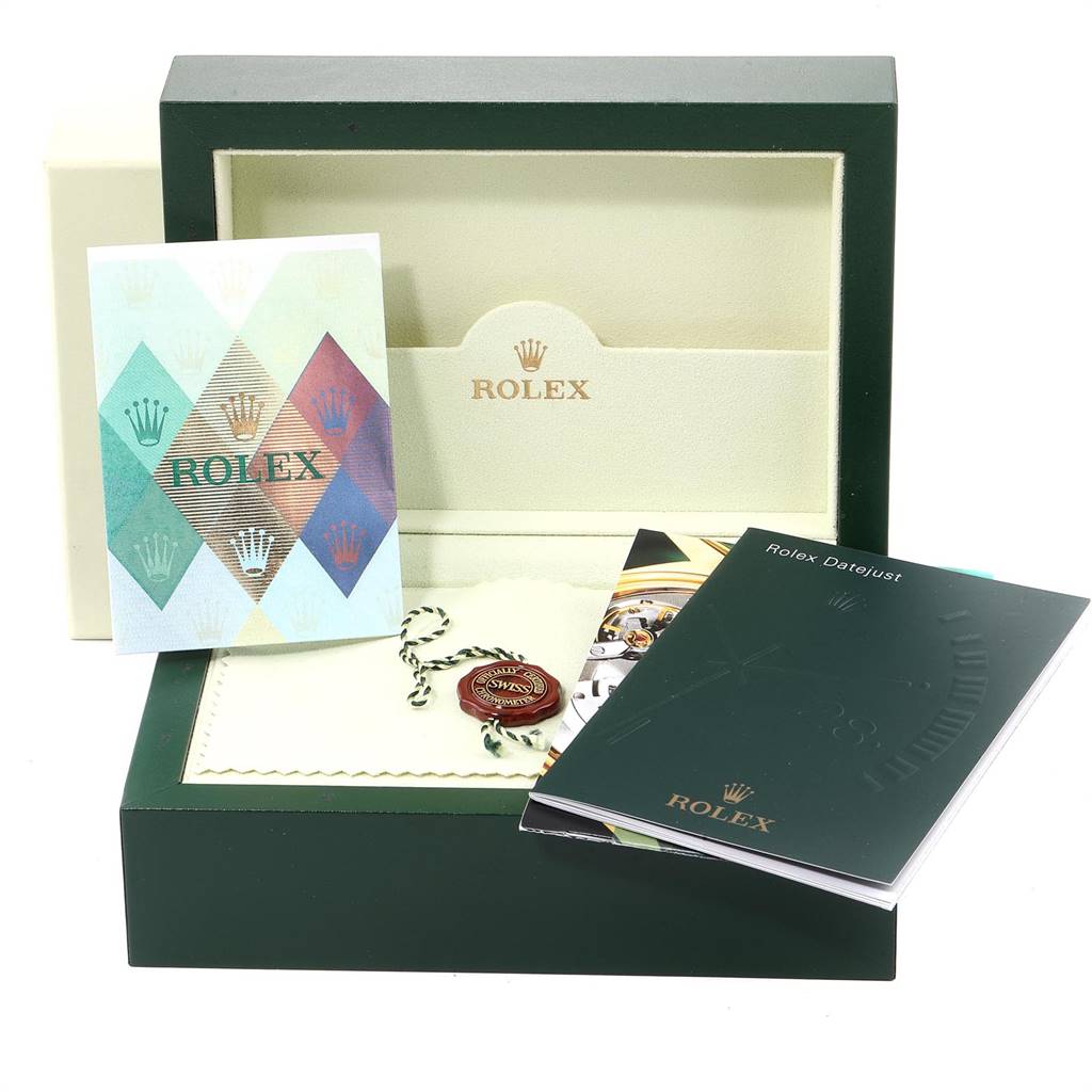 The image shows the open packaging box of a Rolex Datejust 116233 Men's Stainless Steel White Dial 116233 Men's Stainless Steel White Dial watch, with booklets and a seal.