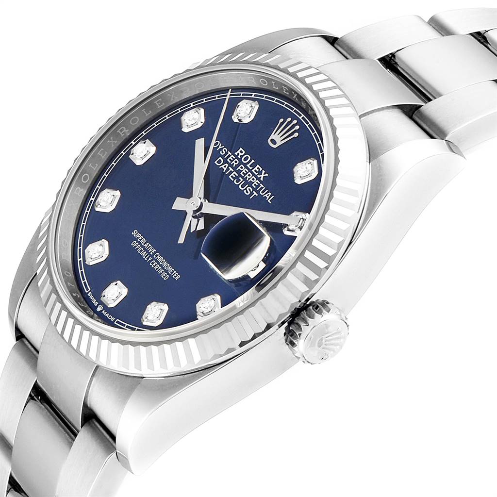 The image shows a close-up side view of the Rolex Datejust 126234 Men's Stainless Steel Blue Dial 126234 Men's Stainless Steel Blue Dial watch, highlighting the face, bezel, crown, and part of the bracelet.
