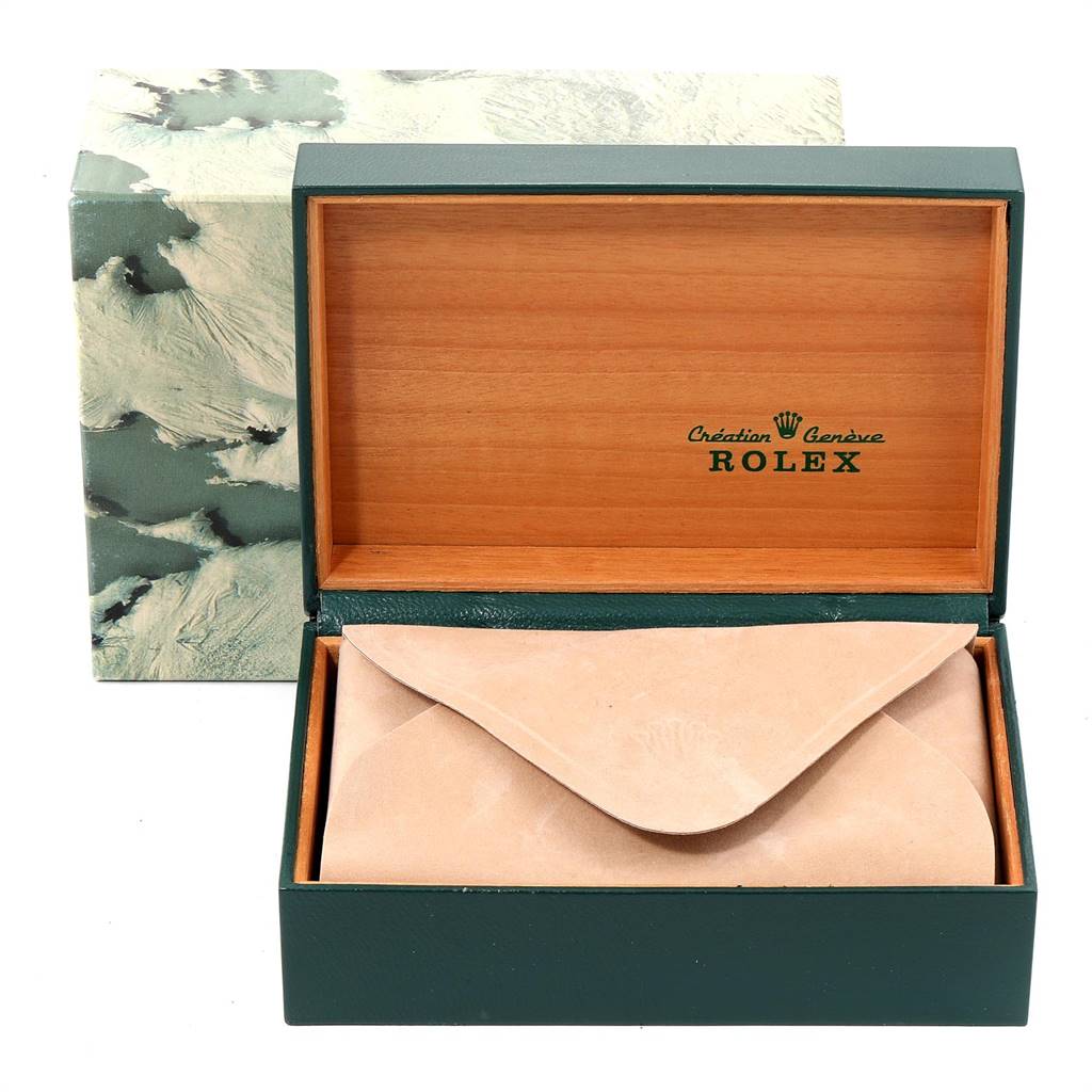 The image shows an open Rolex Datejust 16233 Men's Steel and Gold (two tone) White Dial 16233 Men's Steel and Gold (two tone) White Dial watch box with a beige pouch inside.