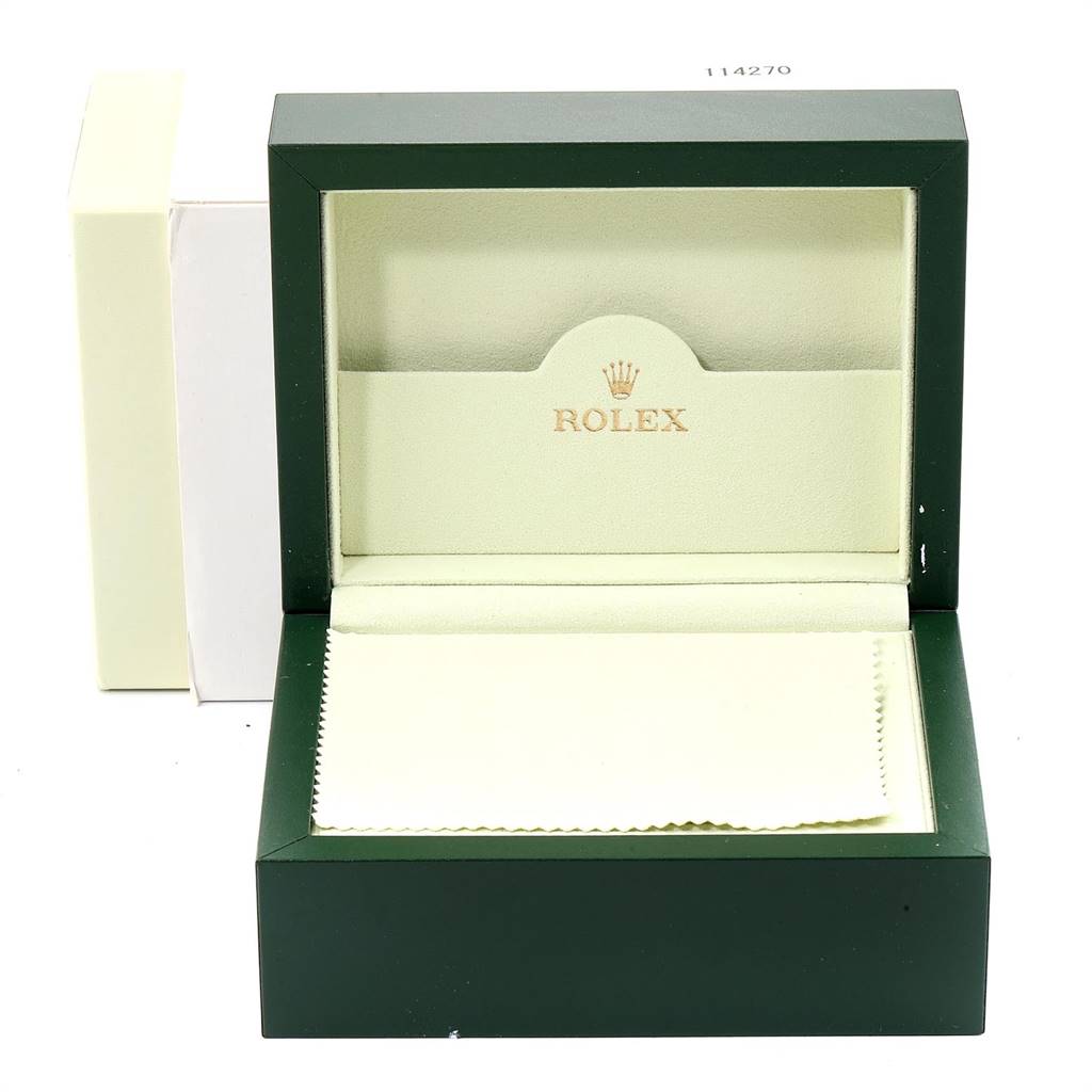 The image shows an open green Rolex watch box for the Datejust model, including the inner case and a cloth.