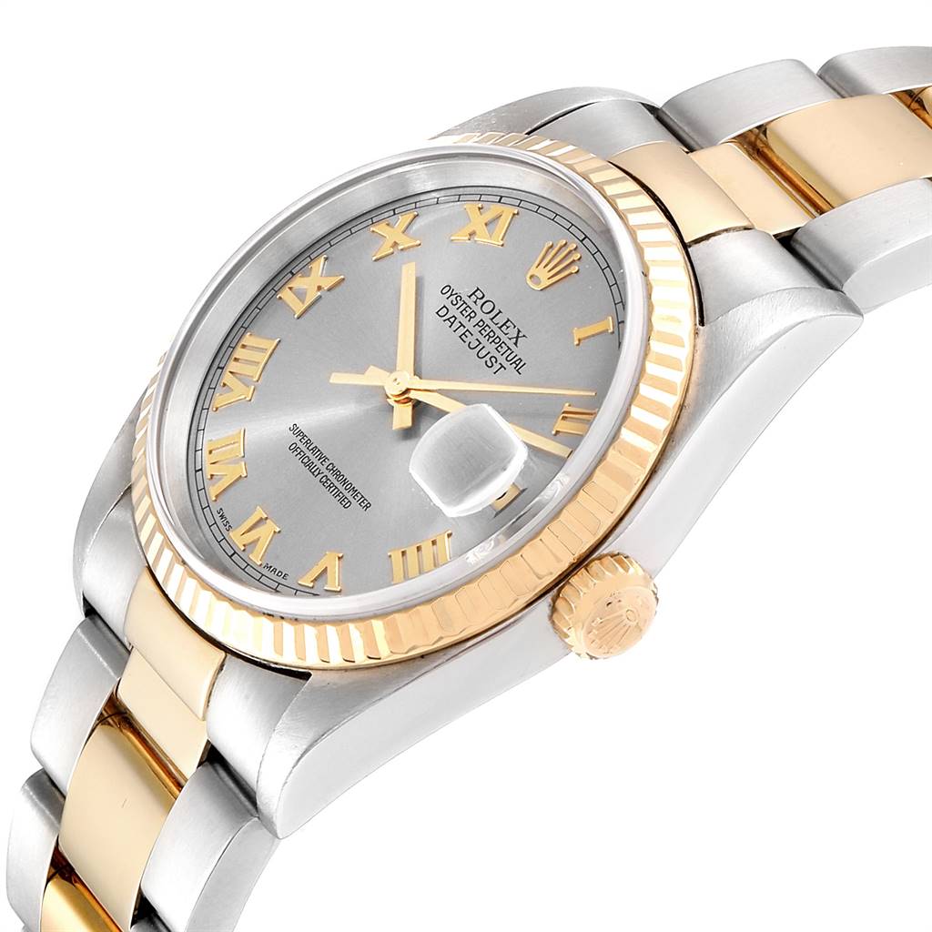 The image shows a Rolex Datejust 16233 Men
s Steel and Gold (two tone) Grey Dial 16233 Men
s Steel and Gold (two tone) Grey Dial model watch from an angled side view, highlighting the dial, bezel, and part of the bracelet.