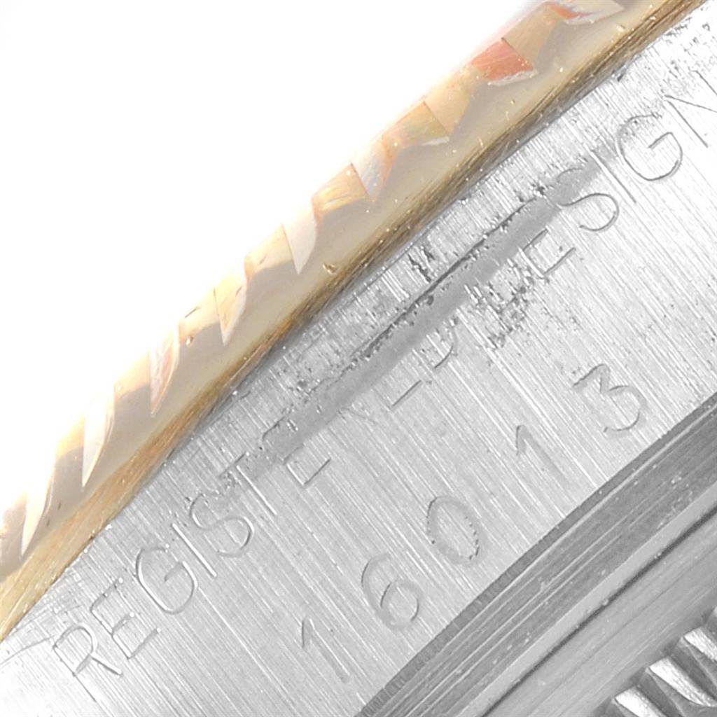 The image shows a close-up view of the model number 16013 etched on the case side of a Rolex Datejust 16013 Men
s Stainless Steel Champagne Dial 16013 Men
s Stainless Steel Champagne Dial watch.