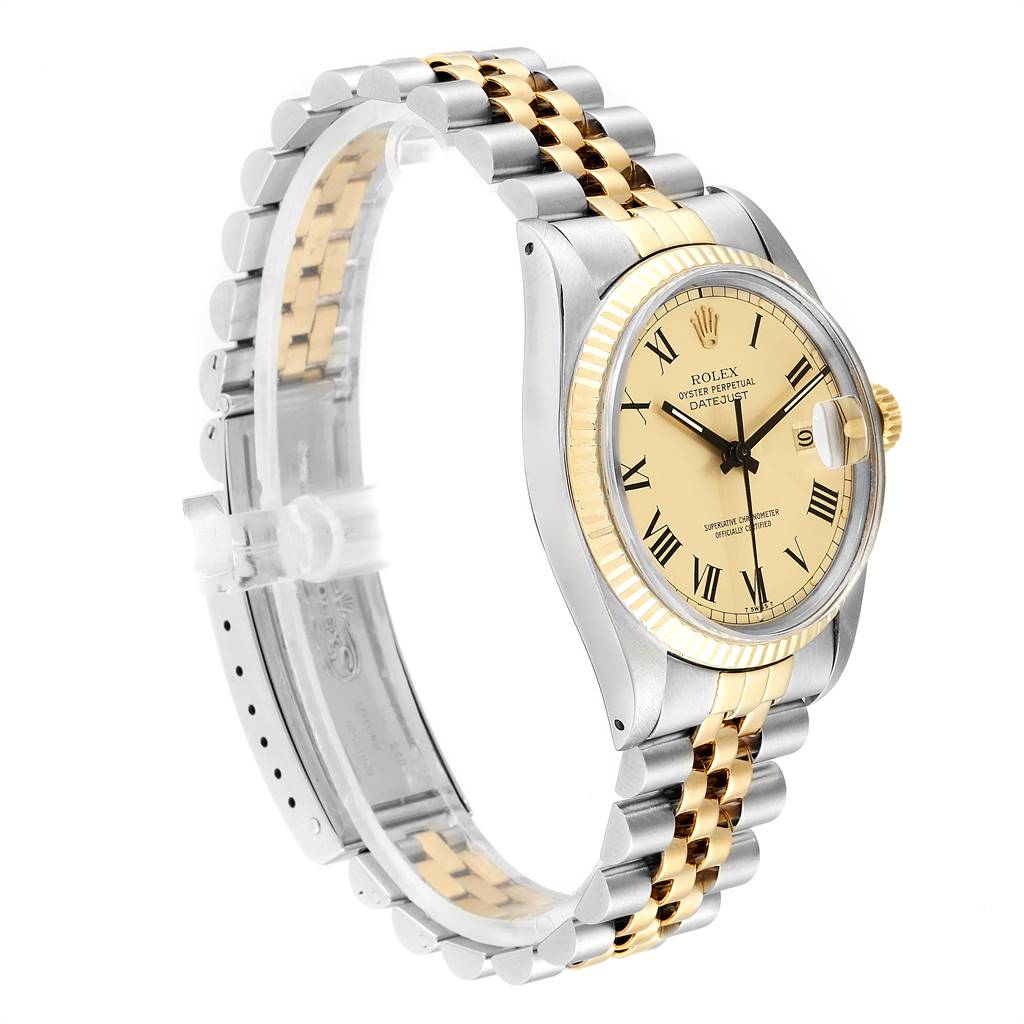This Rolex Datejust 16013 Men
s Stainless Steel Champagne Dial 16013 Men
s Stainless Steel Champagne Dial watch is shown at a three-quarter angle, displaying the face, bezel, case, and two-tone Jubilee bracelet.