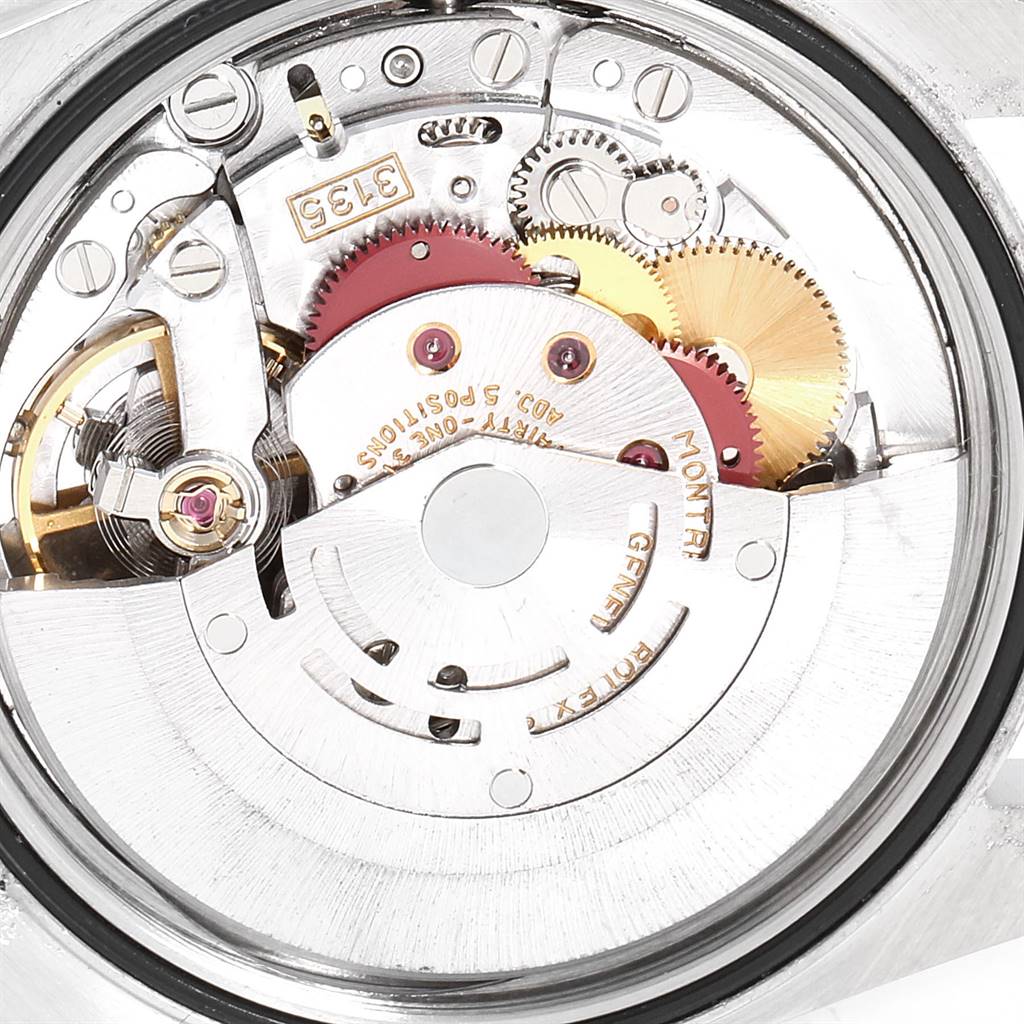 This image shows a close-up view of the movement and internal mechanisms of a Rolex Datejust 16233 Men's Steel and Gold (two tone) Beige Dial 16233 Men's Steel and Gold (two tone) Beige Dial watch.