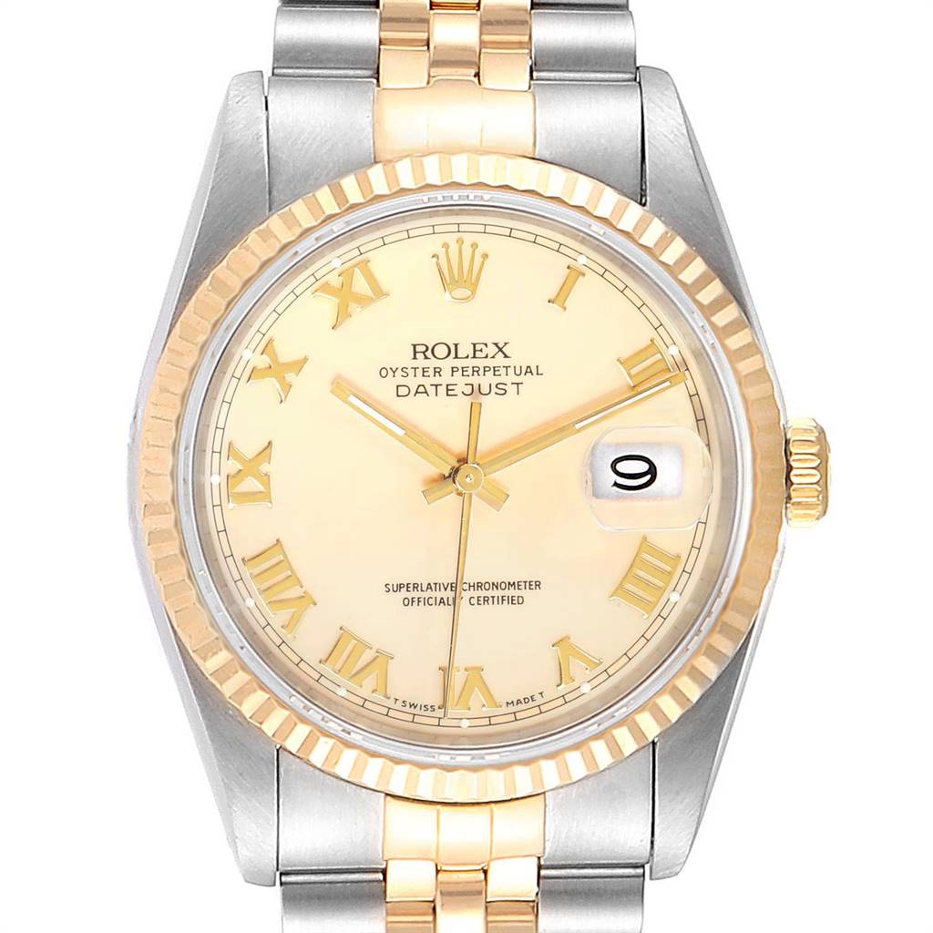 This image shows a close-up view of the Rolex Datejust 16233 Men's Steel and Gold (two tone) Beige Dial 16233 Men's Steel and Gold (two tone) Beige Dial, displaying the dial, hands, bezel, and part of the bracelet.