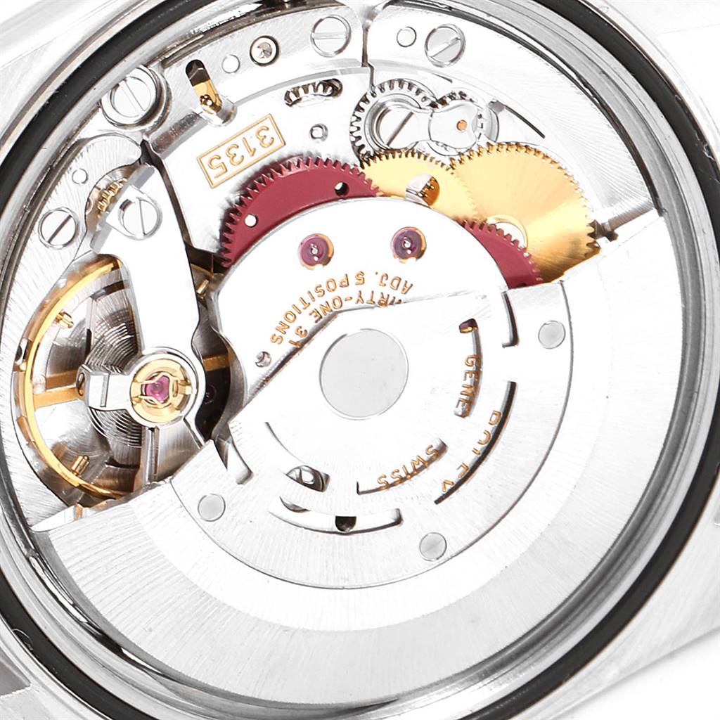 This image shows the internal mechanical movement of a Rolex Datejust 16220 Men's Stainless Steel Silver Dial 16220 Men's Stainless Steel Silver Dial watch, highlighting gears and other intricate components.
