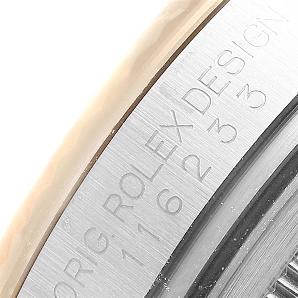 The image shows a close-up of the bezel and case side of the Rolex Datejust 25825 Men's Stainless Steel White Dial 25825 Men's Stainless Steel White Dial watch, highlighting the engraved text.