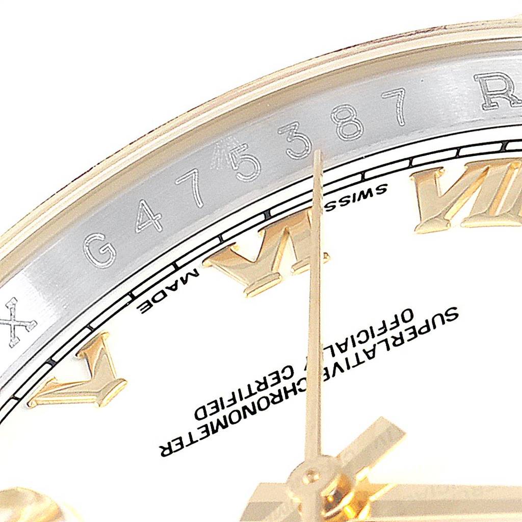 This close-up angle shows the Roman numerals and text on the dial of a Rolex Datejust 25825 Men's Stainless Steel White Dial 25825 Men's Stainless Steel White Dial watch.
