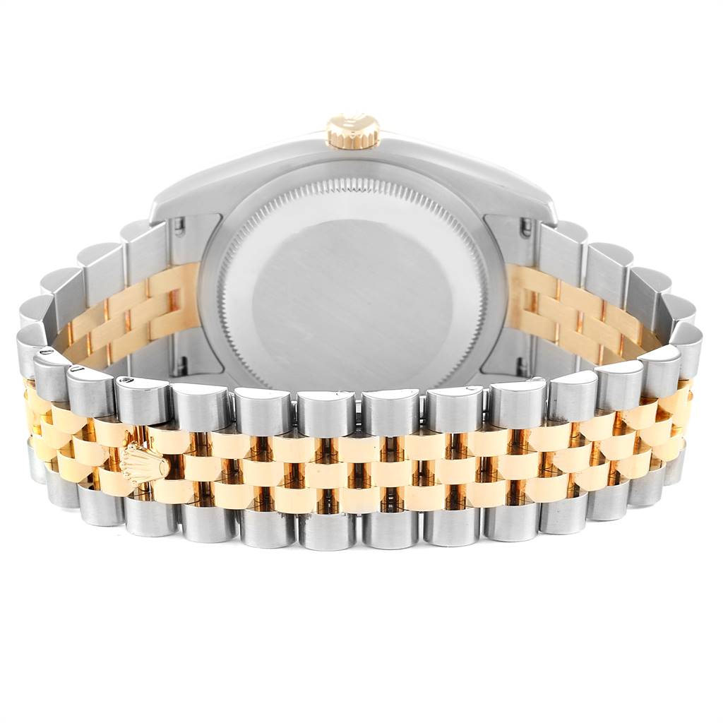 This image shows the backside of the Rolex Datejust 25825 Men's Stainless Steel White Dial 25825 Men's Stainless Steel White Dial watch, focusing on the case back and two-tone bracelet.