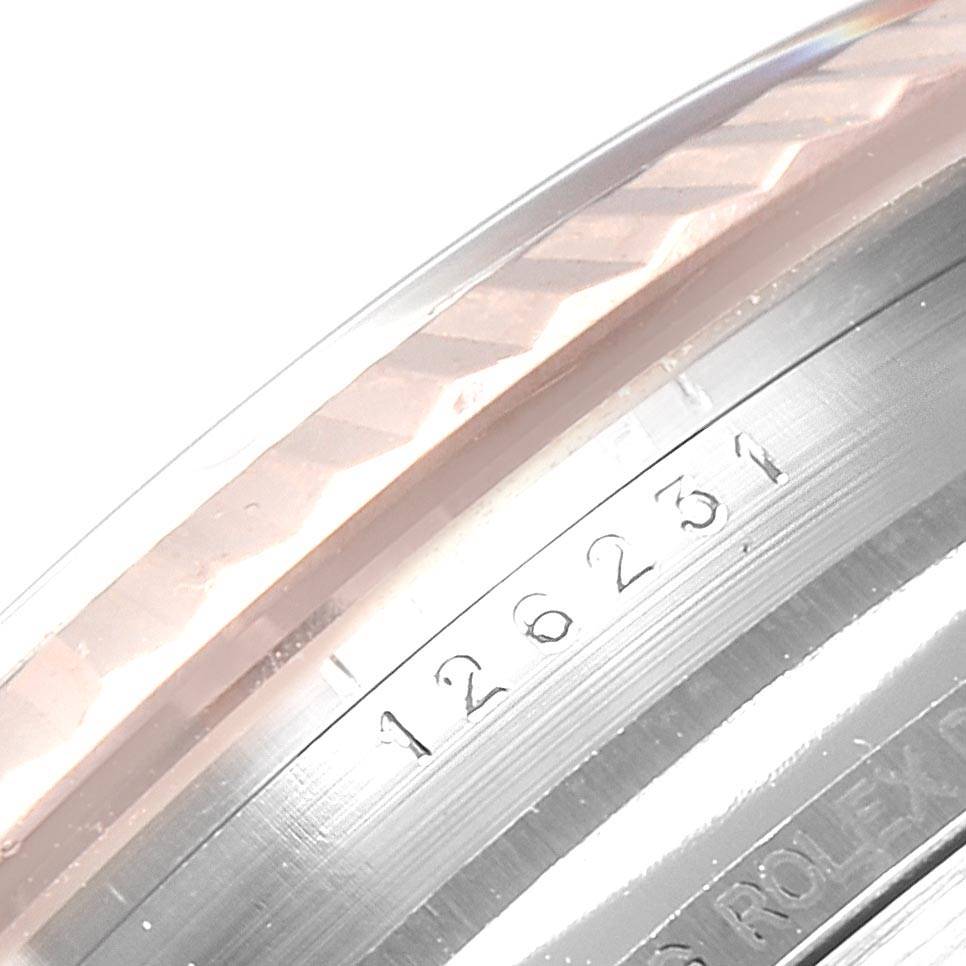 This close-up image shows the model number engraved on the bezel and case edge of a Rolex Datejust 126231 Men's Steel and Gold (two tone) Grey Dial 126231 Men's Steel and Gold (two tone) Grey Dial watch.