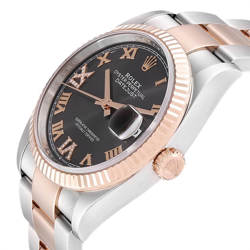 The image shows a close-up side angle of a Rolex Datejust 126231 Men's Steel and Gold (two tone) Grey Dial 126231 Men's Steel and Gold (two tone) Grey Dial watch, highlighting the crown, bezel, and part of the bracelet.