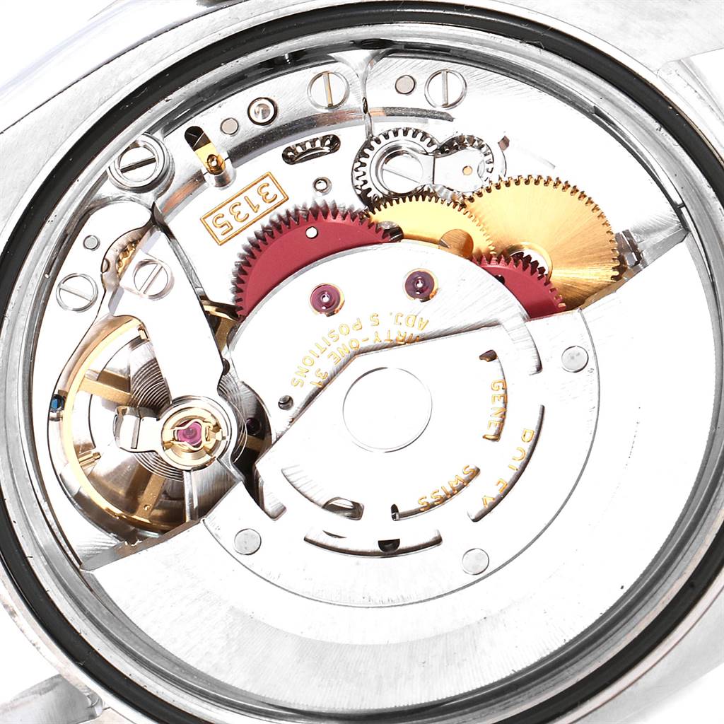 This is an inside view of the movement and gear mechanism of a Rolex Datejust 116244 Men's Stainless Steel Silver Dial 116244 Men's Stainless Steel Silver Dial watch.