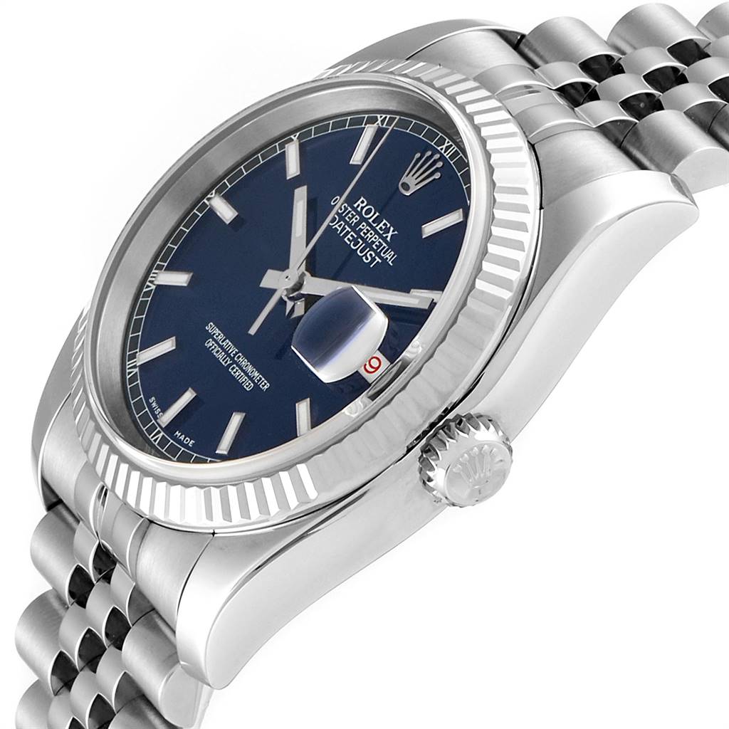 This image shows a Rolex Datejust 116234 Men's Stainless Steel Blue Dial 116234 Men's Stainless Steel Blue Dial watch at an angled close-up, highlighting the dial, bezel, crown, and part of the bracelet.