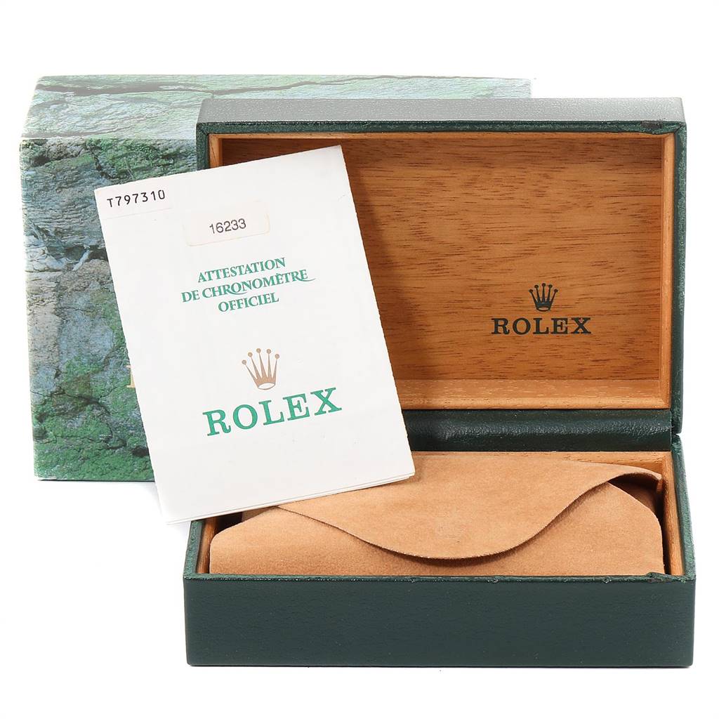 This image shows the open box, cushion, and official chronometer certificate for the Rolex Datejust 16233 Men's Steel and Gold (two tone) Champagne Dial 16233 Men's Steel and Gold (two tone) Champagne Dial model.