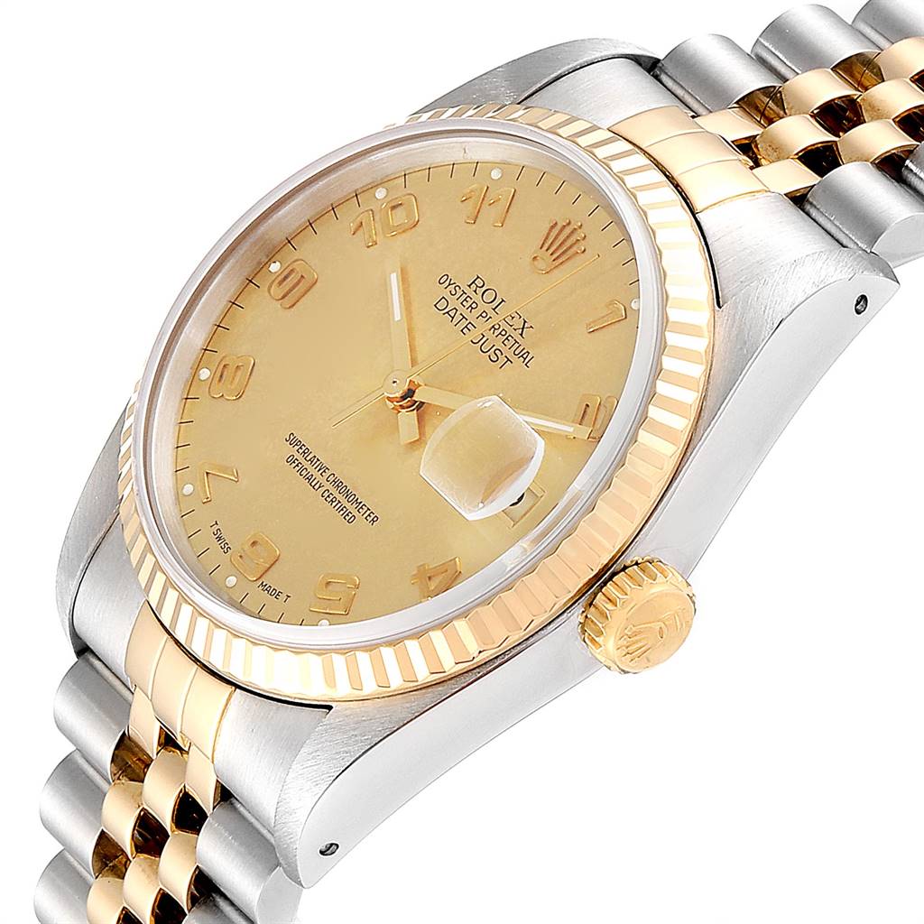 This image shows a close-up of the Rolex Datejust 16233 Men's Steel and Gold (two tone) Champagne Dial 16233 Men's Steel and Gold (two tone) Champagne Dial watch at an angle, highlighting the dial, crown, and bracelet.