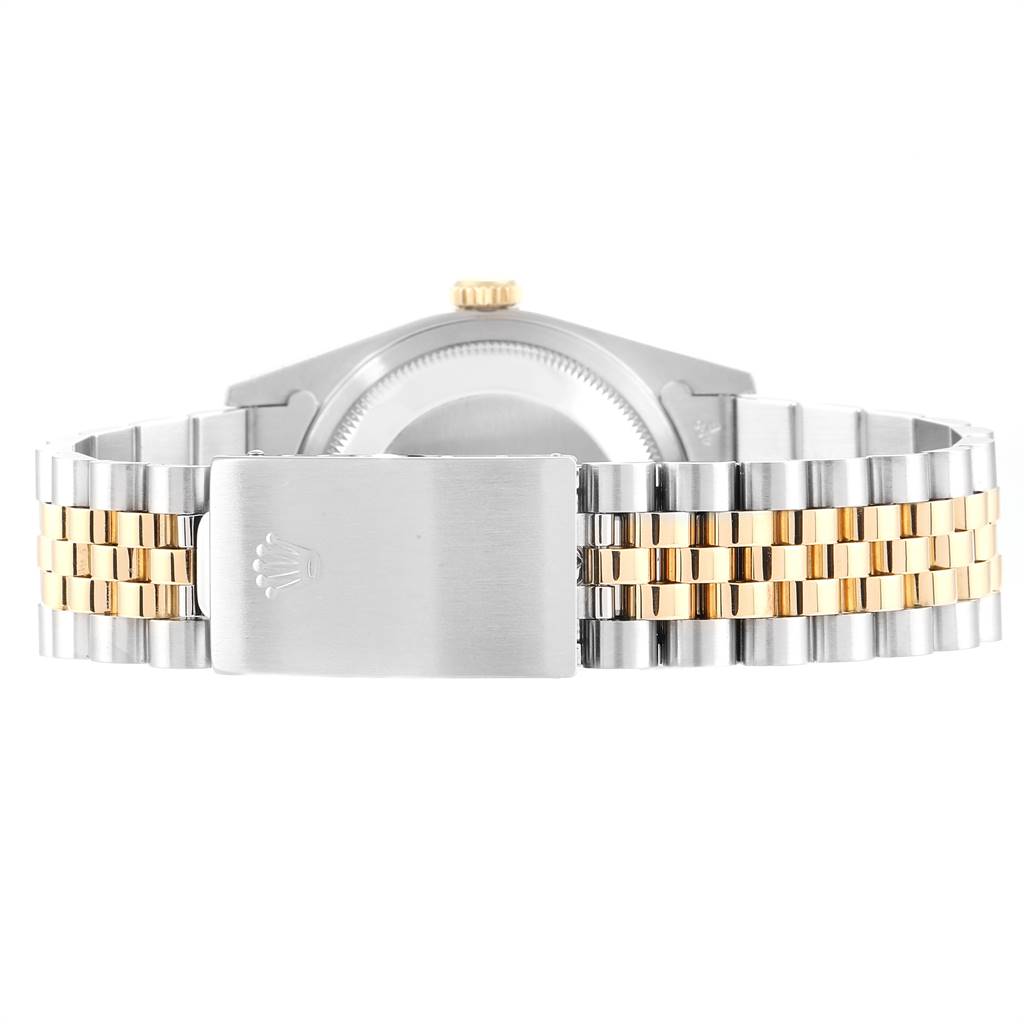 The image shows the back of a Rolex Datejust 16233 Men's Steel and Gold (two tone) Champagne Dial 16233 Men's Steel and Gold (two tone) Champagne Dial watch, highlighting the two-tone bracelet and clasp.