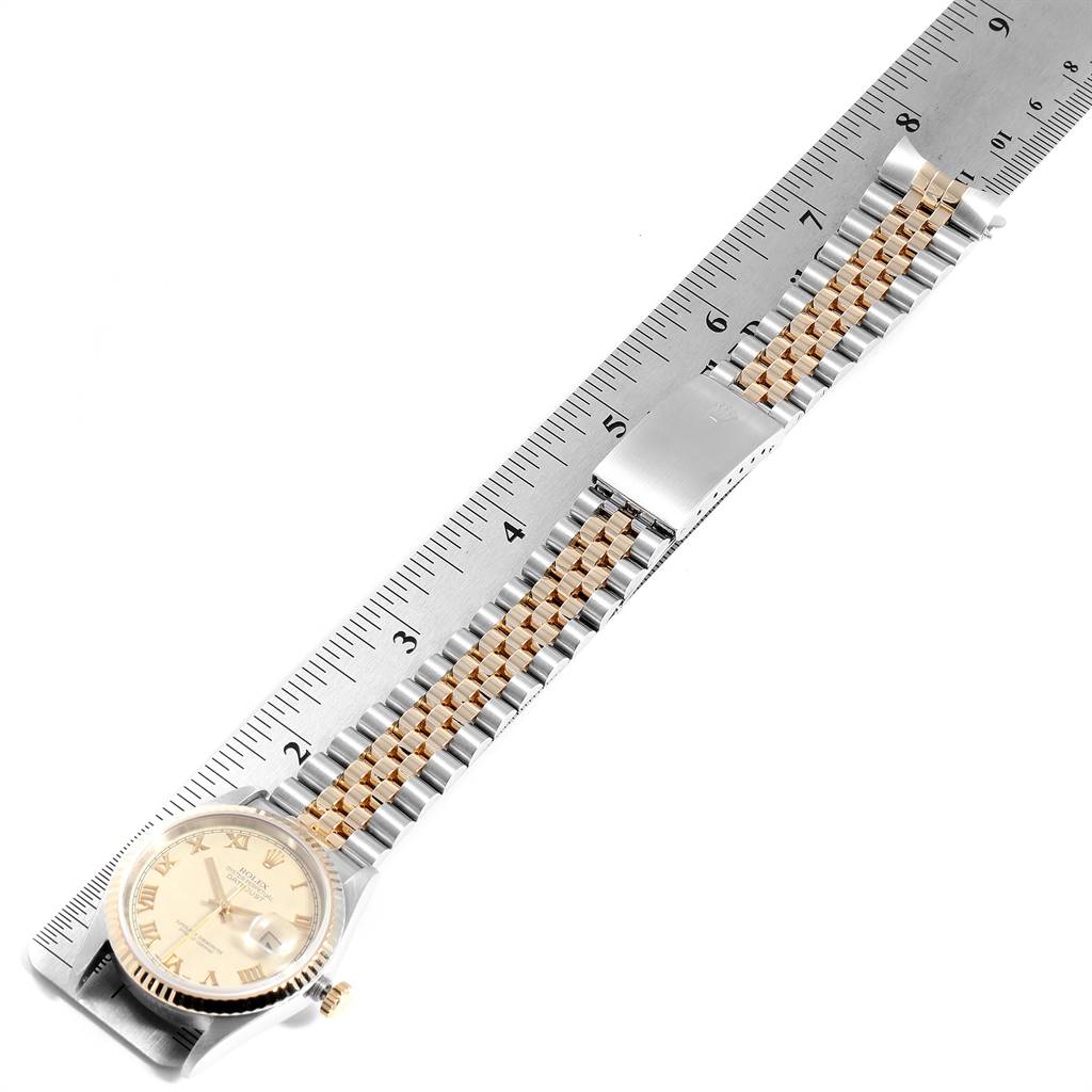 The image shows a Rolex Datejust 16233 Men's Steel and Gold (two tone) Beige Dial 16233 Men's Steel and Gold (two tone) Beige Dial watch at a top-down angle with a ruler for size reference.