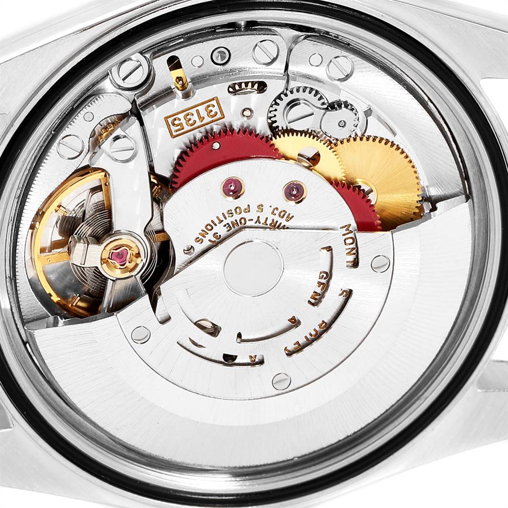 This image shows the internal movement mechanism of a Rolex Datejust 16233 Men's Steel and Gold (two tone) Beige Dial 16233 Men's Steel and Gold (two tone) Beige Dial watch from a back angle.