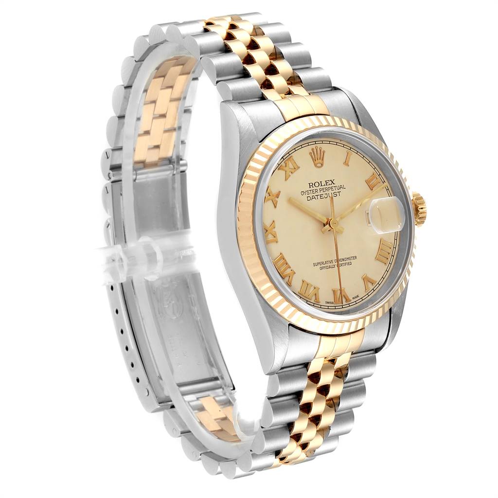 This Rolex Datejust 16233 Men's Steel and Gold (two tone) Beige Dial 16233 Men's Steel and Gold (two tone) Beige Dial watch is shown at a left side angle, highlighting the face, bezel, and two-tone bracelet.
