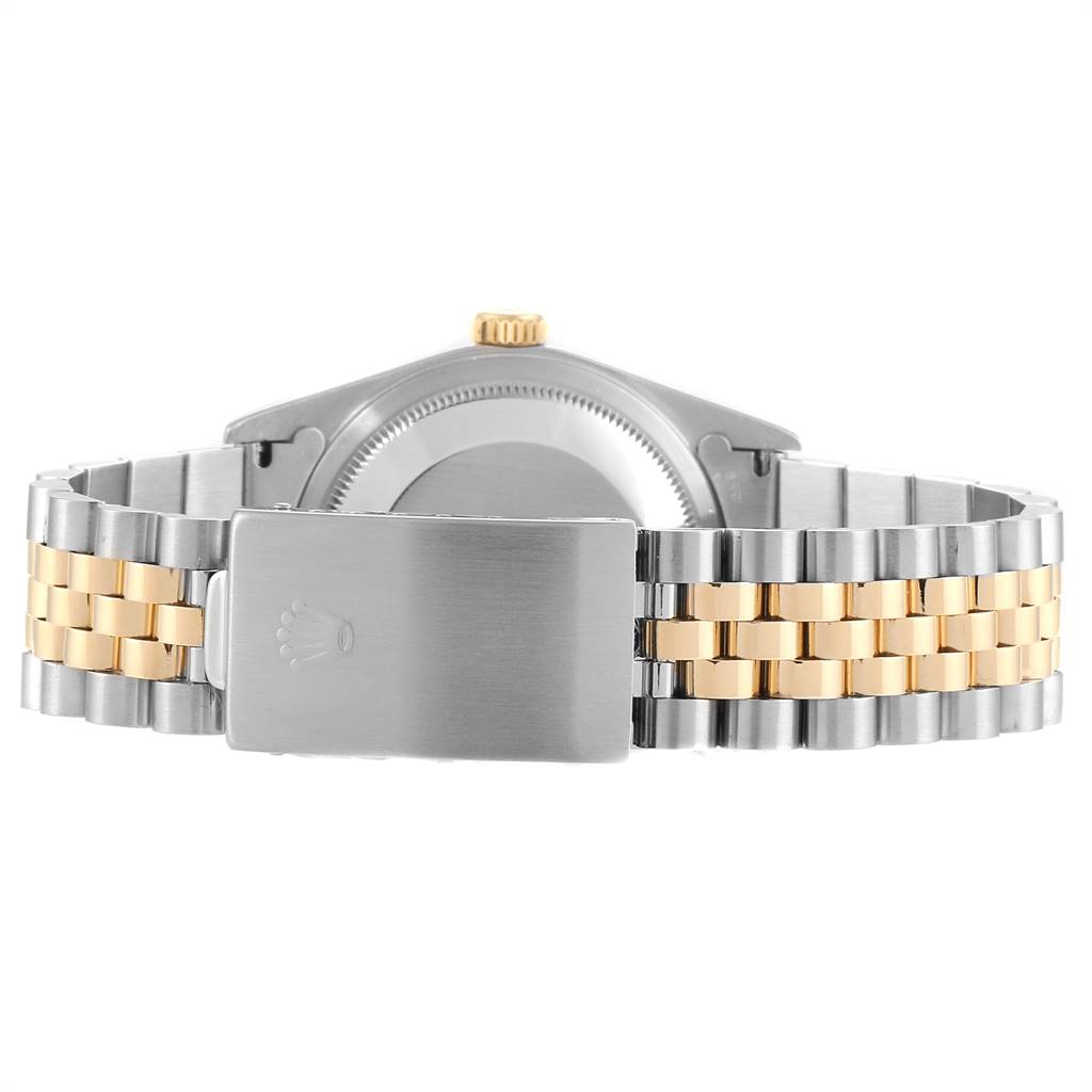This image shows the back view of a Rolex Datejust 16233 Men's Steel and Gold (two tone) Beige Dial 16233 Men's Steel and Gold (two tone) Beige Dial watch, focusing on its clasp and two-tone bracelet.